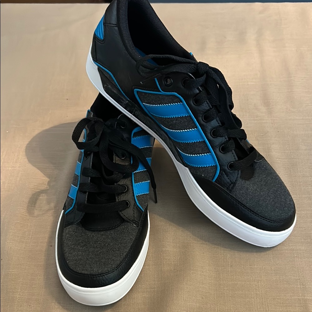 Adidas Black and Blue Sneakers Sleek Athletic Design